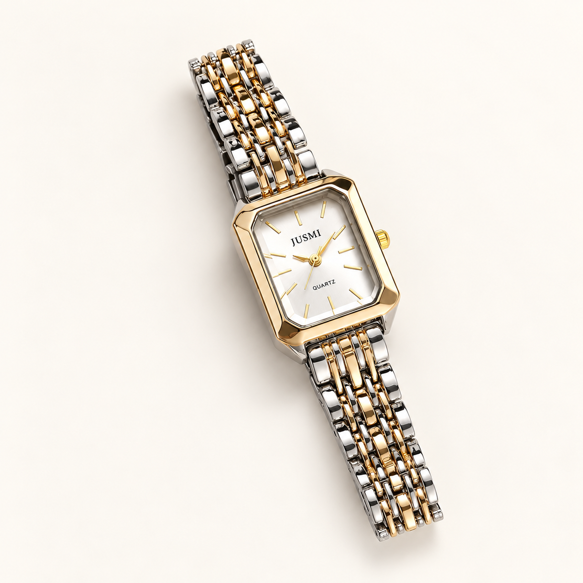 Duo Glow Watch in two-tone with a white dial on a beige background